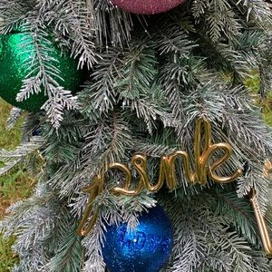 Pink display tree from 2018 holiday floorset